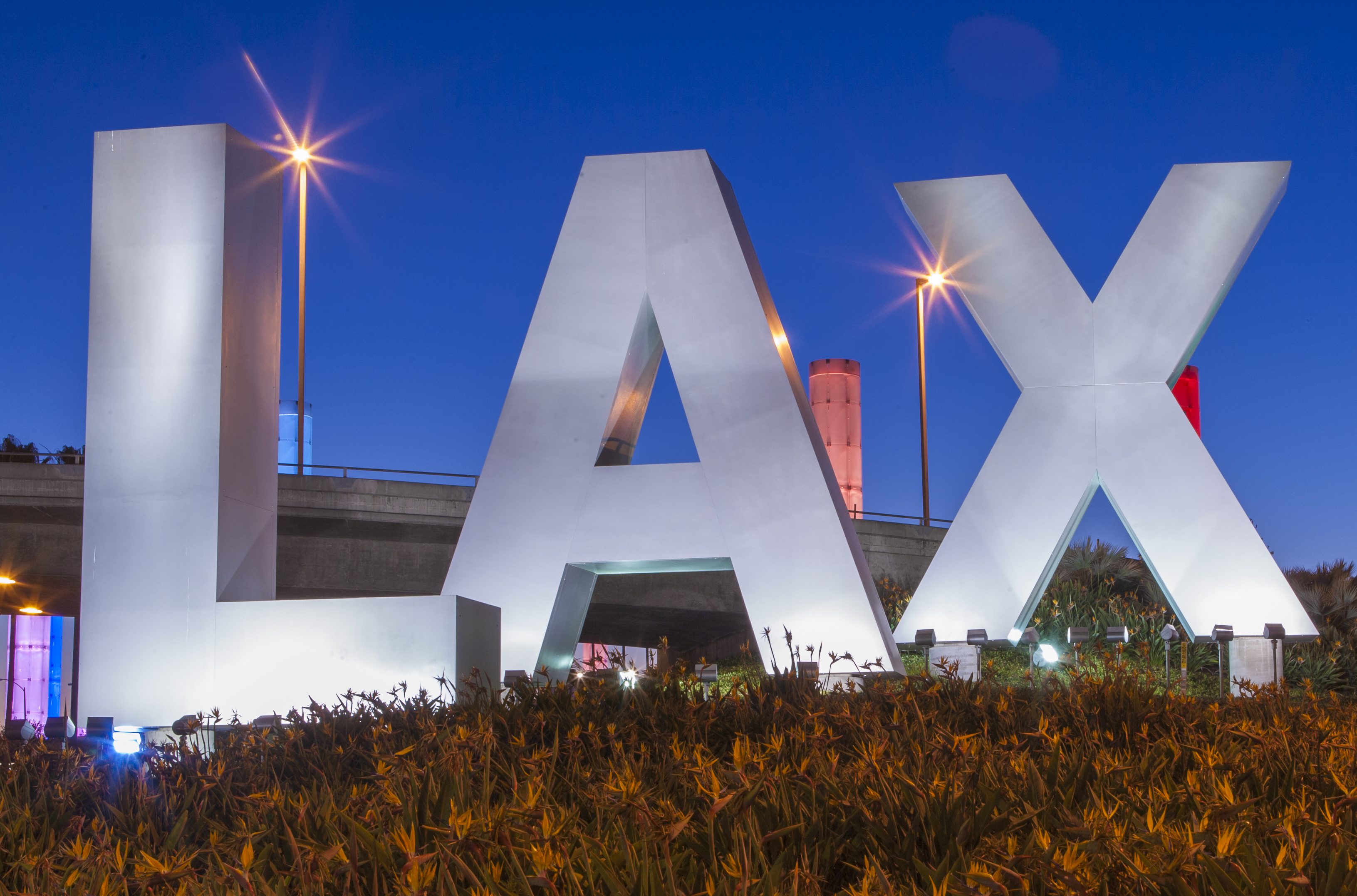 LAX sign at entrance to Los Angeles International Airport.