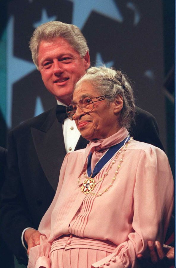 US President Bill Clinton stands with civil rights